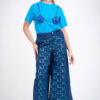 Pantalon en denim à découpe avec motif logo marque pailleté - bleu