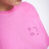 Tee shirt à petit logo en strass - rose